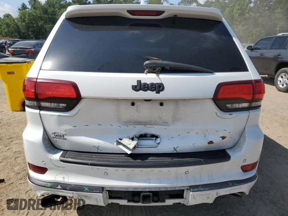 2018 Jeep Grand Cherokee High Altitude with VIN 1C4RJECG1JC260482, listed as a Copart auction lot 57310115 with 144,320 mi miles and Salvage title. Bid and sale history available at DreamBid. Image 6.