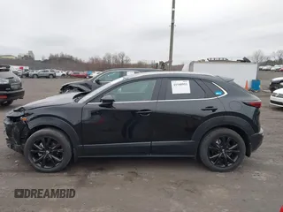 2024 Mazda CX-30 S Select Sport with VIN 3MVDMBBM9RM710086, listed as a IAAI auction lot 41940951 with 1,790 mi miles and . Bid and sale history available at carsss.com. Image 14.