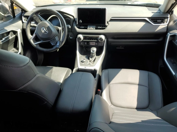 2023 Toyota RAV4 Hybrid XLE Premium z VIN JTMB6RFV5PD080395, wystawiony jako Copart lot #54899515 z przebiegiem 9 190 mil mil oraz Szkoda całkowita • Salvage title. Historia ofert i sprzedaży dostępna na DreamBid. Obrazek 8.
