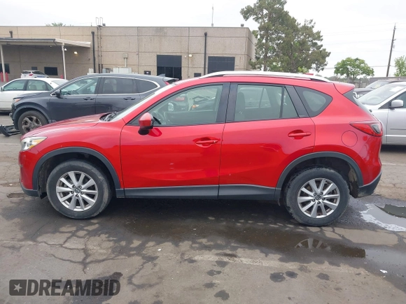 2015 Mazda CX-5 Sport z VIN JM3KE2BE9F0452625, wystawiony jako IAAI lot #42114867 z przebiegiem 167 849 mil mil oraz . Historia ofert i sprzedaży dostępna na DreamBid. Obrazek 13.