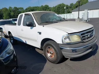 2003 Ford F-150 XL with VIN 1FTRX17W13NB93902, listed as a IAAI auction lot 42670081 with 145,918 mi miles and . Bid and sale history available at DreamBid. Image 1.