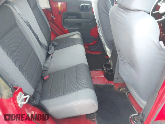 2007 Jeep Wrangler Unlimited X with VIN 1J4GA39197L171132, listed as a IAAI auction lot 41716963 with 145,442 mi miles and . Bid and sale history available at DreamBid. Image 8.