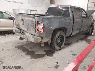 2011 Chevrolet Silverado 1500 LT with VIN 3GCPKSE33BG295102, listed as a IAAI auction lot 41557299 with 228,821 mi miles. Bid and sale history available at carsss.com. Image 4.
