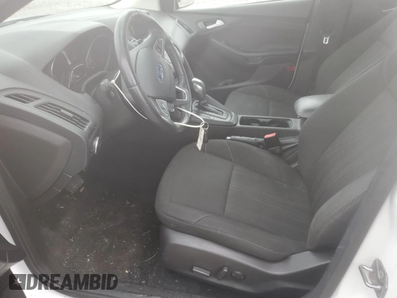2016 Ford Focus SE с VIN 1FADP3F27GL397700, выставлен на аукционе Copart как лот 59692675 с пробегом 98 188 миль миль и Списание • Salvage title. История ставок и продаж доступна на DreamBid. Изображение 7.