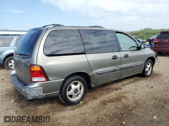 2003 Ford Windstar LX with VIN 2FMZA51413BB77562, listed as a Copart auction lot 56861095 with 170,562 mi miles and Salvage title. Bid and sale history available at DreamBid. Image 3.