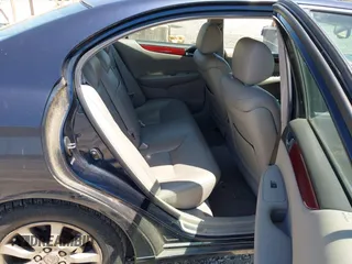 2004 Lexus ES 350 with VIN JTHBA30G340011986, listed as a IAAI auction lot 42077593 with 211,467 mi miles and . Bid and sale history available at DreamBid. Image 8.