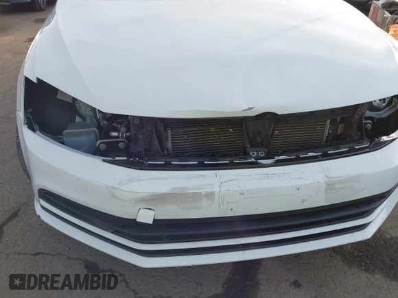 2016 Volkswagen Jetta Sedan 1.4T SE with VIN 3VWD67AJXGM365869, listed as a IAAI auction lot 41261109 with 59,325 mi miles. Bid and sale history available at carsss.com. Image 6.