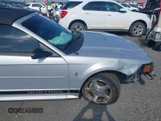 2002 Ford Mustang Deluxe with VIN 1FAFP44432F205991, listed as a IAAI auction lot 42144709 with 138,119 mi miles and . Bid and sale history available at DreamBid. Image 16.
