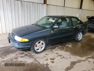 1996 Ford Escort z VIN 1FASP11J0TW123967, wystawiony jako Copart lot #52859835 z przebiegiem 164 693 mil mil oraz Szkody całkowita. Historia ofert i sprzedaży dostępna na DreamBid. Obrazek 1.