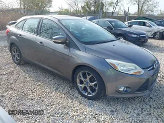 2013 Ford Focus SE with VIN 1FADP3F22DL117712, listed as a IAAI auction lot 42131439 with 124,327 mi miles. Bid and sale history available at carsss.com. Image 1.