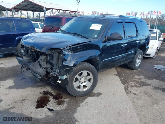 2008 GMC Yukon Denali with VIN 1GKFK63888J139246, listed as a IAAI auction lot 41649830 with 328,472 mi miles. Bid and sale history available at carsss.com. Image 2.