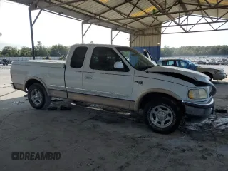 1998 Ford F-150 XL with VIN 1FTRX17L8WNA36541, listed as a Copart auction lot 70861344 with 266,137 mi miles and Salvage title. Bid and sale history available at DreamBid. Image 4.