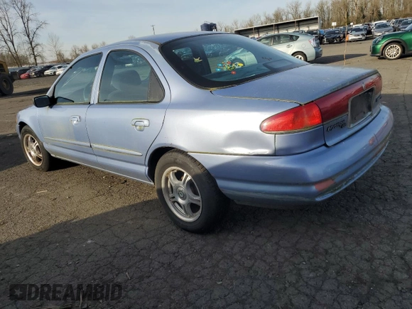 1996 Mercury Mystique z VIN 1MELM6532TK639432, wystawiony jako Copart lot #41884055 z przebiegiem 134 991 mil mil oraz Tytuł czysty. Historia ofert i sprzedaży dostępna na DreamBid. Obrazek 2.
