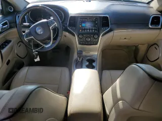 2017 Jeep Grand Cherokee Overland with VIN 1C4RJFCT3HC755960, listed as a Copart auction lot 52268895 with 99,998 mi miles and Salvage title. Bid and sale history available at DreamBid. Image 8.