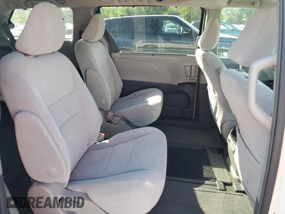 2015 Toyota Sienna LE with VIN 5TDJK3DC2FS126466, listed as a Copart auction lot 61165105 with 56,634 mi miles and Salvage title. Bid and sale history available at DreamBid. Image 11.