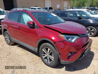 2018 Toyota RAV4 XLE with VIN 2T3WFREVXJW434957, listed as a IAAI auction lot 42002561 with 111,590 mi miles and . Bid and sale history available at carsss.com. Image 1.