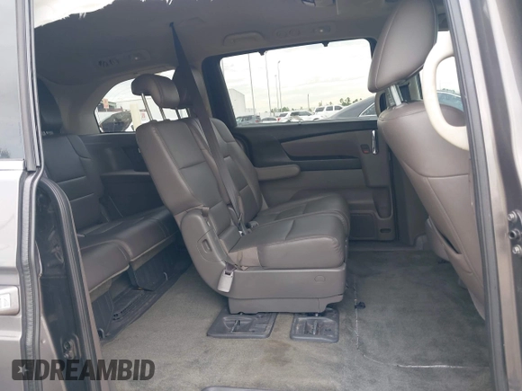 2015 Honda Odyssey Touring Elite with VIN 5FNRL5H99FB089642, listed as a IAAI auction lot 42591786 with 100,755 mi miles and . Bid and sale history available at DreamBid. Image 8.