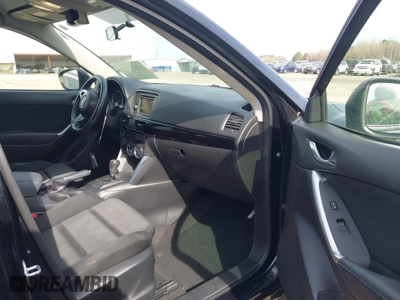 2014 Mazda CX-5 Touring with VIN JM3KE2CY9E0333951, listed as a IAAI auction lot 41825345 with 124,684 mi miles. Bid and sale history available at carsss.com. Image 5.