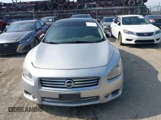 2014 Nissan Maxima S z VIN 1N4AA5AP6EC910967, wystawiony jako IAAI lot #42124722 z przebiegiem 111 986 mil mil oraz . Historia ofert i sprzedaży dostępna na DreamBid. Obrazek 12.
