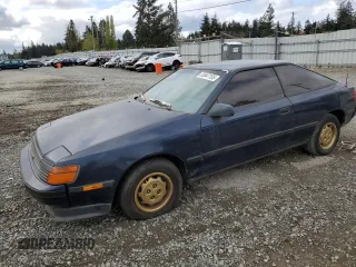 1988 Toyota Celica z VIN JT2ST67L0J7222767, wystawiony jako Copart lot #53647155 z przebiegiem 103 345 mil mil oraz Tytuł czysty. Historia ofert i sprzedaży dostępna na DreamBid. Obrazek 1.