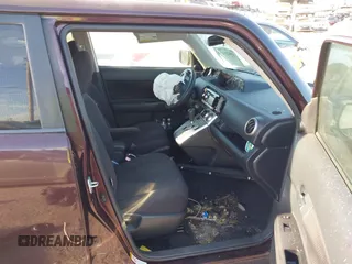 2010 Scion xB with VIN JTLZE4FE8A1113455, listed as a IAAI auction lot 40523410 with 1 mi miles. Bid and sale history available at carsss.com. Image 5.