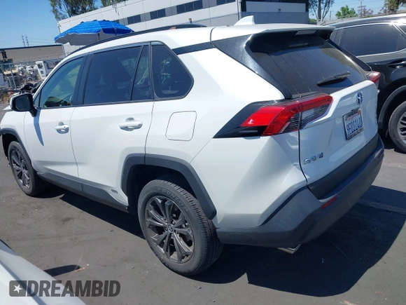 2023 Toyota RAV4 Hybrid XLE Premium with VIN JTMB6RFV0PD087237, listed as a IAAI auction lot 42606802 with 16,872 mi miles and . Bid and sale history available at DreamBid. Image 3.