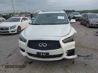 2020 Infiniti QX60 Pure with VIN 5N1DL0MN2LC531102, listed as a IAAI auction lot 41918887 with 55,284 mi miles and . Bid and sale history available at DreamBid. Image 13.