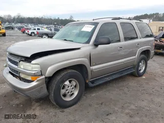 2002 Chevrolet Tahoe LT with VIN 1GNEC13Z22J256805, listed as a IAAI auction lot 41302460 with 249,578 mi miles. Bid and sale history available at carsss.com. Image 2.