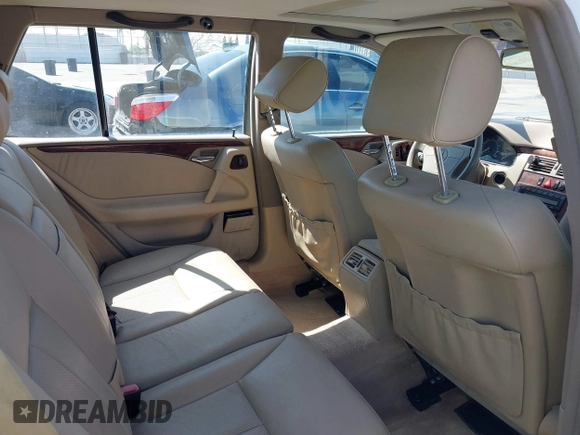 1999 Mercedes-Benz E-Class with VIN WDBJH65F7XA787254, listed as a IAAI auction lot 41884002 with 1 mi miles. Bid and sale history available at carsss.com. Image 8.