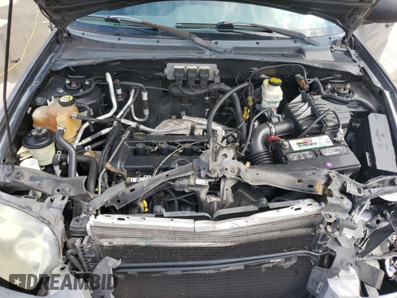 2005 Ford Escape XLS Value with VIN 1FMYU02Z35KA59568, listed as a Copart auction lot 71720604 with 184,007 mi miles and Salvage Title. Bid and sale history available at carsss.com. Image 12.