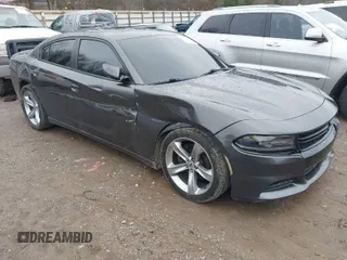 2015 Dodge Charger RT with VIN 2C3CDXCTXFH729177, listed as a IAAI auction lot 41115285 with 135,517 mi miles and . Bid and sale history available at DreamBid. Image 1.