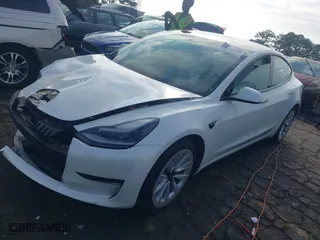 2021 Tesla Model 3 Long Range with VIN 5YJ3E1EB6MF061231, listed as a IAAI auction lot 40716544 with 9,787 mi miles. Bid and sale history available at carsss.com. Image 19.