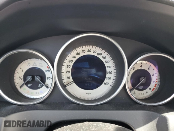2015 Mercedes-Benz E 400 with VIN WDDKK6FFXFF301128, listed as a Copart auction lot 76691954 with 49,313 mi miles and Salvage title. Bid and sale history available at DreamBid. Image 9.
