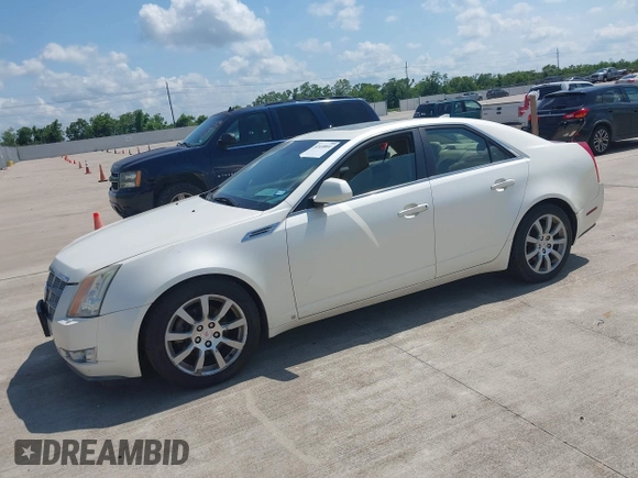 2009 Cadillac CTS AWD z VIN 1G6DS57V690103191, wystawiony jako IAAI lot #42418891 z przebiegiem 151 562 mil mil oraz . Historia ofert i sprzedaży dostępna na DreamBid. Obrazek 2.