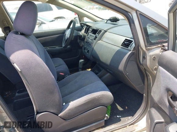 2008 Nissan Versa S with VIN 3N1BC13E28L402729, listed as a IAAI auction lot 42410907 with 319,129 mi miles and . Bid and sale history available at DreamBid. Image 5.