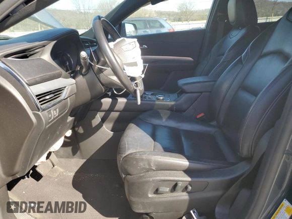 2021 Cadillac XT4 AWD Premium Luxury with VIN 1GYFZDR47MF002175, listed as a Copart auction lot 48303665 with 94,698 mi miles and Salvage Title. Bid and sale history available at carsss.com. Image 7.