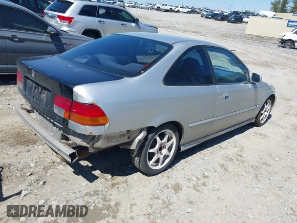 1998 Honda Civic DX with VIN 1HGEJ6123WL130983, listed as a IAAI auction lot 41836867 with 290,461 mi miles. Bid and sale history available at carsss.com. Image 4.