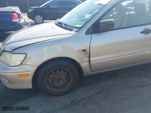 2003 Mitsubishi Lancer ES with VIN JA3AJ26E63U007501, listed as a IAAI auction lot 41771016 with 146,984 mi miles. Bid and sale history available at carsss.com. Image 6.