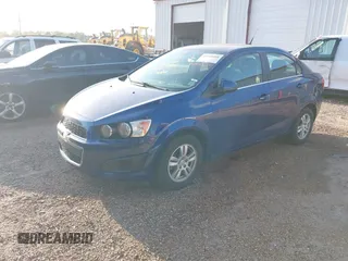 2014 Chevrolet Sonic LT with VIN 1G1JC5SH3E4228384, listed as a IAAI auction lot 41940480 with 127,176 mi miles and . Bid and sale history available at DreamBid. Image 2.