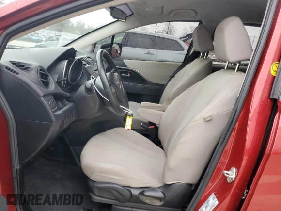 2015 Mazda 5 Sport with VIN JM1CW2BL3F0180789, listed as a Copart auction lot 48019355 with 111,247 mi miles and Salvage Title. Bid and sale history available at DreamBid. Image 7.