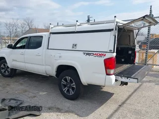 2017 Toyota Tacoma SR5 with VIN 3TMDZ5BN4HM018877, listed as a IAAI auction lot 41898666 with 198,848 mi miles. Bid and sale history available at carsss.com. Image 3.