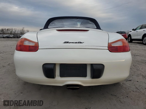 2000 Porsche Boxster z VIN WP0CA2980YU622861, wystawiony jako Copart lot #78993794 z przebiegiem 129 631 mil mil oraz Czysty tytuł • Clean title. Historia ofert i sprzedaży dostępna na DreamBid. Obrazek 6.