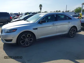 2014 Ford Taurus SHO with VIN 1FAHP2KT8EG123342, listed as a IAAI auction lot 42095390 with 142,957 mi miles. Bid and sale history available at carsss.com. Image 14.
