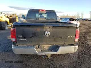 2014 Ram 1500 SLT z VIN 1C6RR7GM2ES279260, wystawiony jako Copart lot #79998644 z przebiegiem 317 046 mil mil oraz Szkoda całkowita • Salvage title. Historia ofert i sprzedaży dostępna na DreamBid. Obrazek 6.