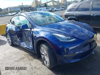 2022 Tesla Model Y Long Range with VIN 7SAYGDEE6NF318372, listed as a IAAI auction lot 41526857 with 26,083 mi miles and . Bid and sale history available at carsss.com. Image 1.