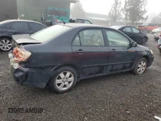 2005 Toyota Corolla CE with VIN 1NXBR30E75Z463700, listed as a Copart auction lot 84317814 with 210,910 mi miles and Clean Title. Bid and sale history available at DreamBid. Image 3.