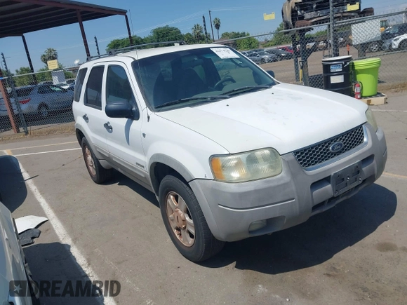 2001 Ford Escape XLT with VIN 1FMYU04131KB70753, listed as a IAAI auction lot 42174549 with 209,485 mi miles and . Bid and sale history available at DreamBid. Image 1.