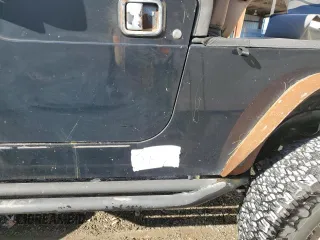 2004 Jeep Wrangler Sport with VIN 1J4FA49S24P754155, listed as a Copart auction lot 45699575 with 147,670 mi miles and Non Repairable. Bid and sale history available at carsss.com. Image 12.