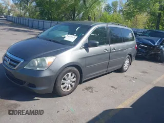 2007 Honda Odyssey EX-L with VIN 5FNRL38777B140916, listed as a IAAI auction lot 42159976 with 167,541 mi miles. Bid and sale history available at carsss.com. Image 2.
