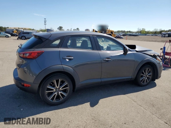 2017 Mazda CX-3 Touring z VIN JM1DKFC72H0167351, wystawiony jako Copart lot #56230945 z przebiegiem 78 894 mil mil oraz Szkody całkowita. Historia ofert i sprzedaży dostępna na DreamBid. Obrazek 3.
